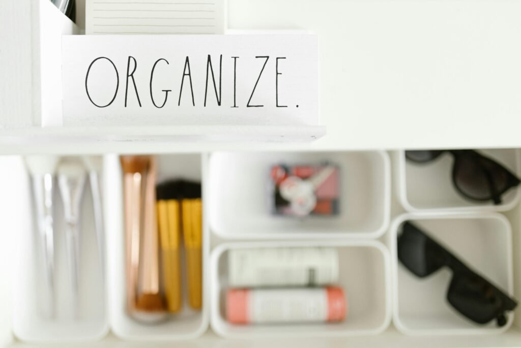 Decluttering & Home Wellness – Organized Living /decluttering-home-wellness in St Albans, Hertfordshire. Organized storage compartments with label ‘Organize’, symbolizing decluttering and home wellness in St Albans, Hertfordshire.